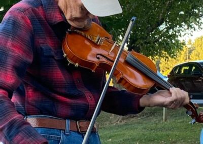 Our own Greenway fiddler expanded the community spirit.